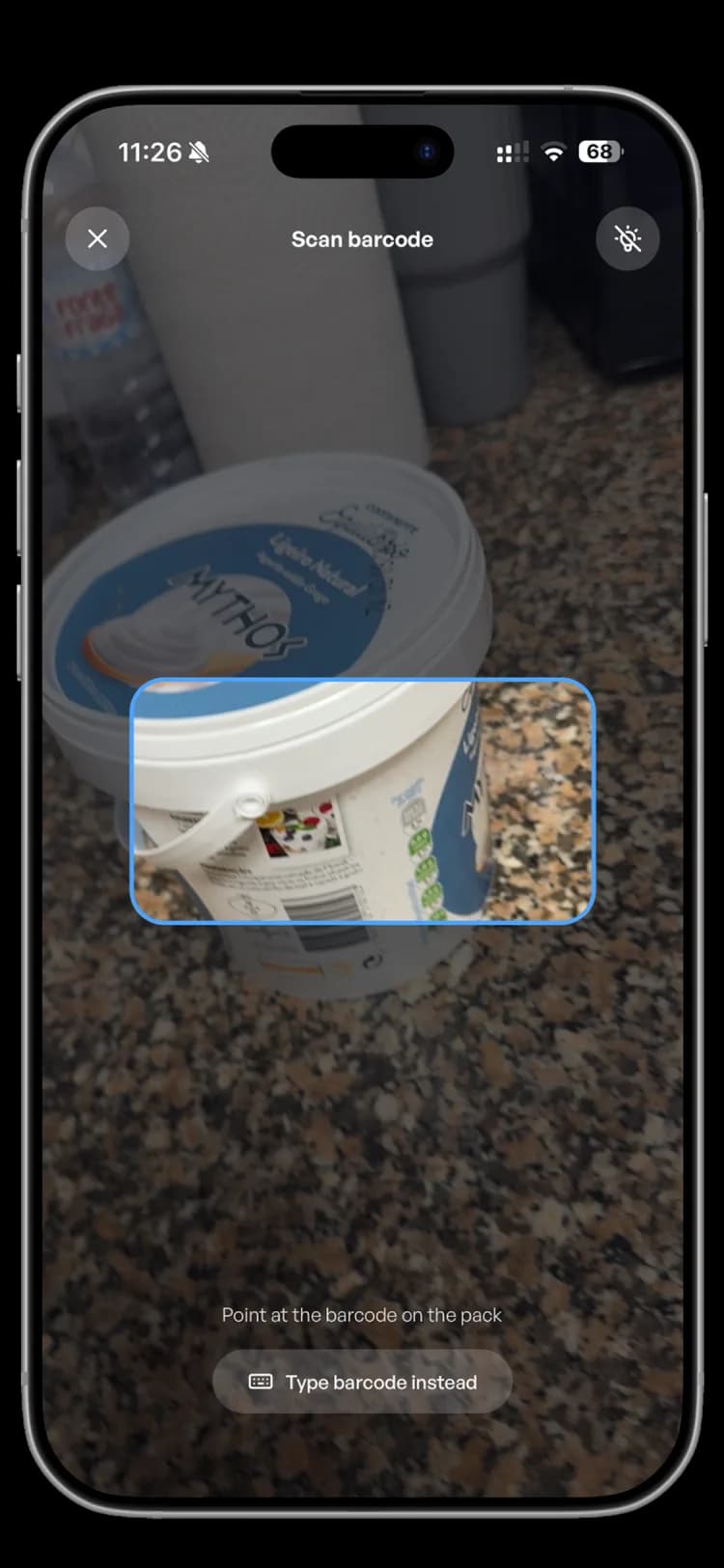 Barcode scanner framing a yogurt tub